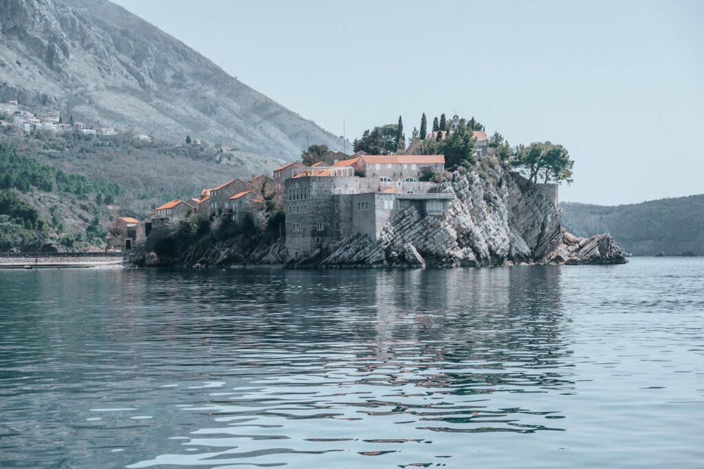 An Island Hotel with an Ancient Fortress and Stone Houses of Sveti Stefan in Montenegro