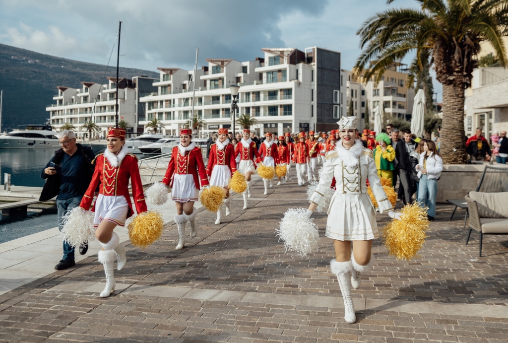 A photo of majorettes march at Mimosa Festival