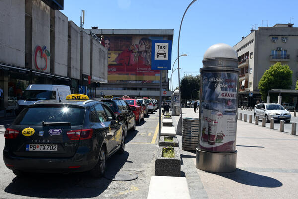 Taxis in Montenegro parking in the centre of Podgorica - Boris Pejović
