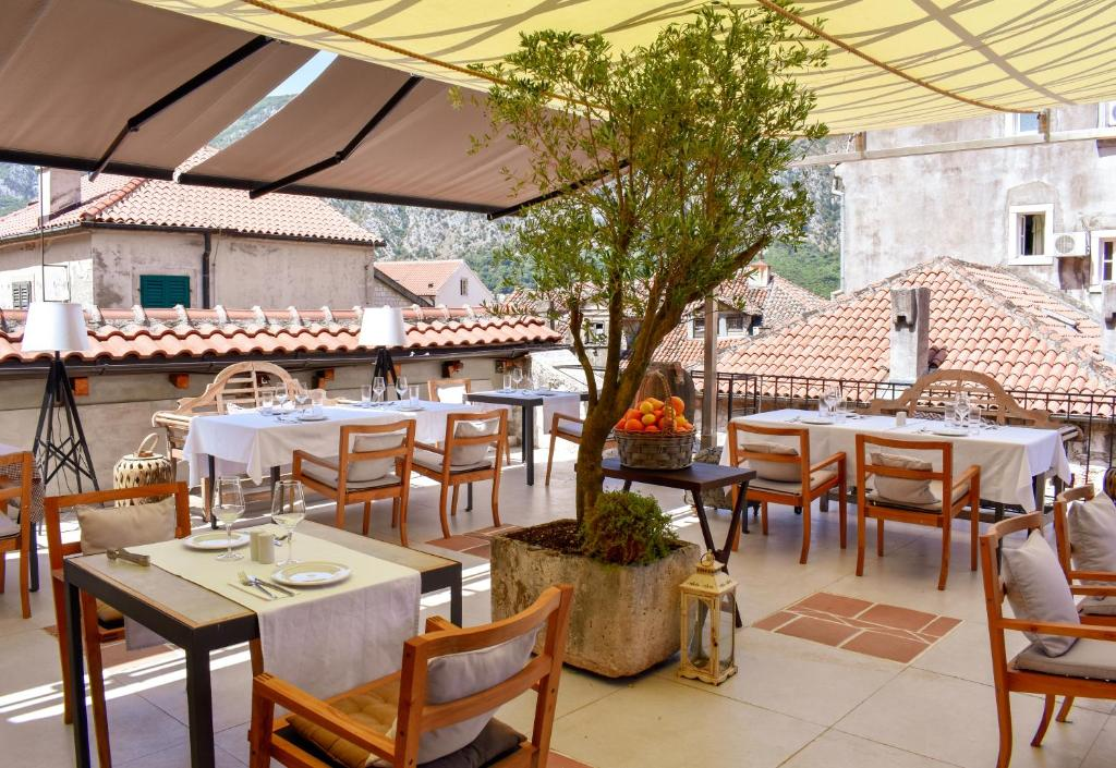 Dining with a view of Kotor's rooftops